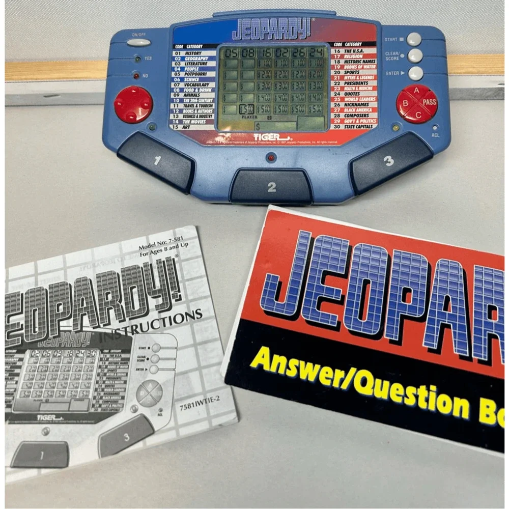 VTG Handheld Jeopardy Electronic Game with Book & Manual Tiger Electronics